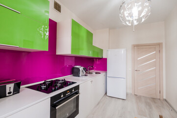 Russia, Moscow- April 25, 2020: interior room cozy. general cleaning, home decoration, preparation house for sale. kitchen and dining room, refectory area, cooking appliances, table furniture stove