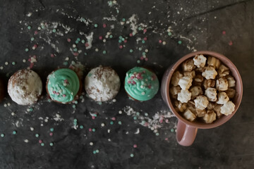 cupcakes in green glaze. powdered sugar.
cocoa or coffee
