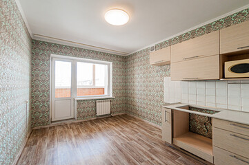 Russia, Moscow- April 25, 2020: interior room cozy. general cleaning, home decoration, preparation house for sale. kitchen and dining room, refectory area, cooking appliances, table furniture stove