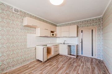 Russia, Moscow- April 25, 2020: interior room cozy. general cleaning, home decoration, preparation house for sale. kitchen and dining room, refectory area, cooking appliances, table furniture stove