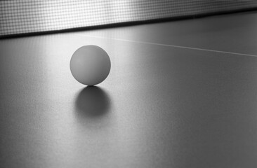 Tennis ball in black and white.
