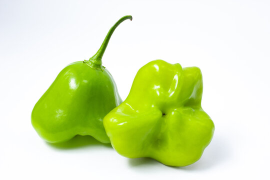 Two green brazilian cambuci peppers