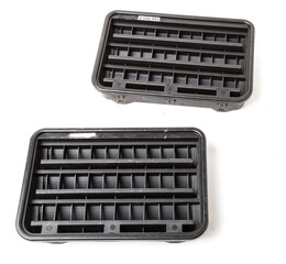 Body ventilation grille flap in black for interior on white isolated background. Used spare parts from junkyard catalog.