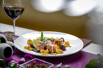 Roll stuffed with mushrooms and vegetables with berry sauce