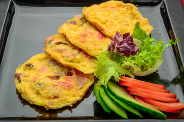Omelet with smoked salmon and broccoli
