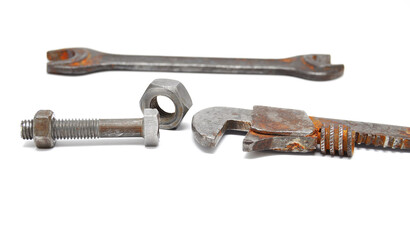 Wrenches covered in rust on white background close up
