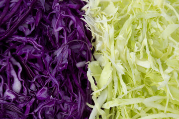 Texture with red and green cabbages, chopped into slices