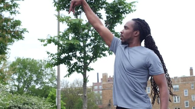 Young man shooting a jump shot