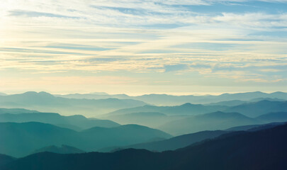 Fototapeta na wymiar Layers of clouds and mountains that unite on the horizon.