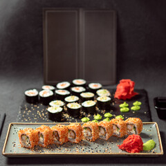 Kani Hot Sushi Roll, California roll and Avocado maki sushi roll top view