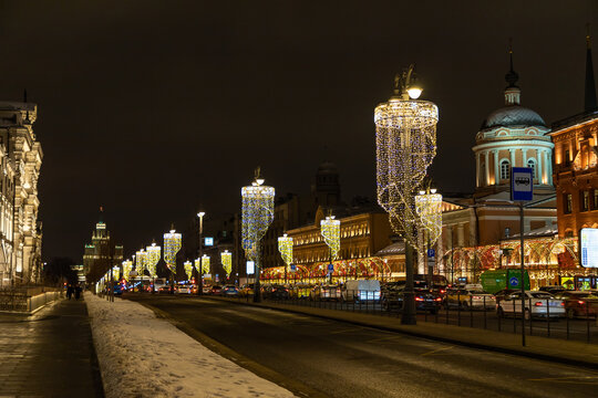 MOSCOW, RUSSIA - JANUARY 6, 2021: Night view from Lubyanskaya square to illuminated Novaya square