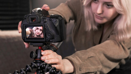 Young content creator girl is filming herself