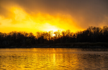 Orange sunset over Lake Tisza