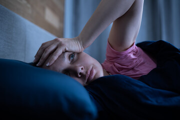 Awake Woman With Insomnia In Bed