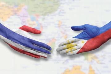 Philippines and Thailand - Flag handshake symbolizing partnership and cooperation