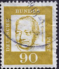 Obraz premium GERMANY - CIRCA 1961: a postage stamp from Germany, showing a portrait of the important German doctor, sociologist, economist Franz Oppenheimer