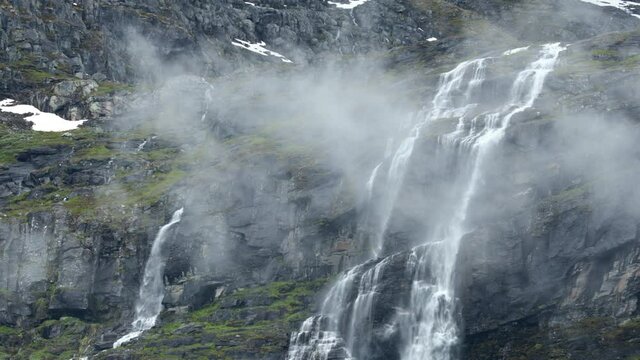 Beautiful nature of Norway. A mountain waterfall from a glacier high in the mountains of Norway.