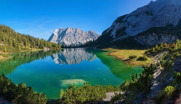 pictorial colorful autumn landscape, tirolean alps, lake Seebensee and zugspitze mountain