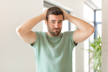 handsome man feeling frustrated and annoyed, sick and tired of failure, fed-up with dull, boring...