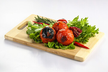 Grilled tomato bbq over board