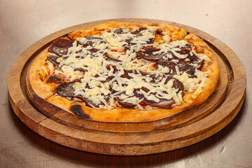 Pizza with dry beef and cheese
