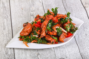 Marinated chicken breast slices with cilantro