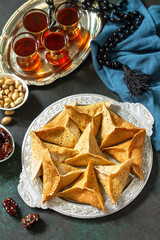 Arabic Cuisine. Ramadan Kareem Festive. Ramadan menu, arabian pancake katayef (katayev, qatayef) and dates, pistachio.