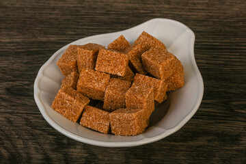 Cane sugar cubs in the bowl