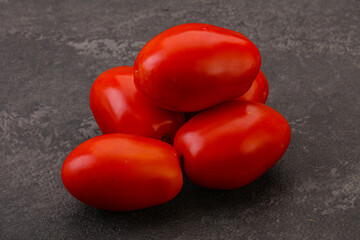 Red bright tasty tomato heap