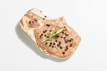 Raw pork loin steak isolated on white background