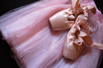 Pointe shoes on a ballet tutu