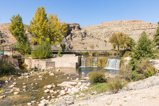 a weir in Ucero river next to El Burgo de Osma-City of Osma, province of Soria, Castile and Leon, Spain