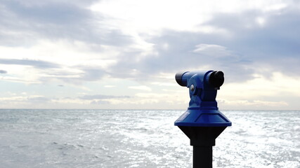 spyglass monocular coin operated against seaside