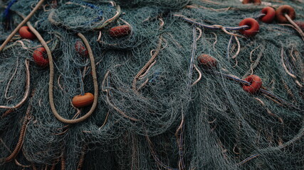 fishing nets stacked heap on