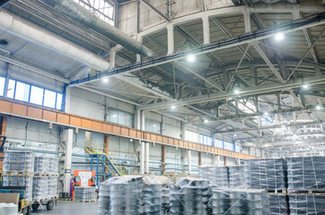 Industrial zone. Production workshop with special equipment. Production of the alloy wheels