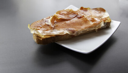 Bread with tomato ham