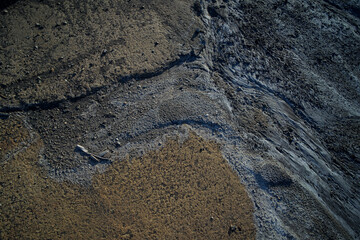 Fototapeta na wymiar patterns in nature salt formations in road salt piles