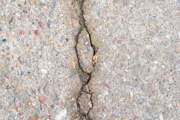Crack in the cemented walkway.