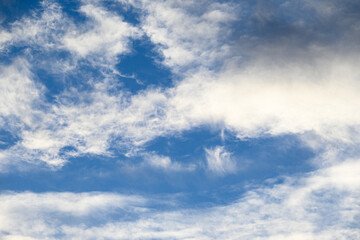 Light and airy cloudscape, white clouds and blue sky as a nature background

