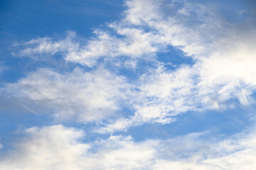 Light and airy cloudscape, white clouds and blue sky as a nature background
