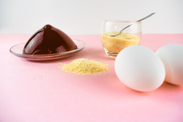 Jelly, gelatin powder and eggs are the main foods containing collagen, essential for youthful skin and healthy joints. Light pink background. Copy space.