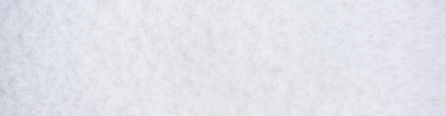 Fresh, wet, heavy snow, pattern and texture in white as a nature background
