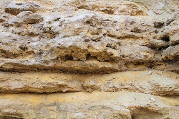 texture: yellow crumbling sandstone