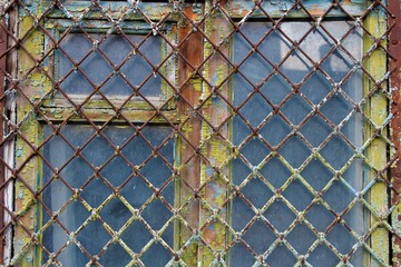 texture: old wooden window with iron bars