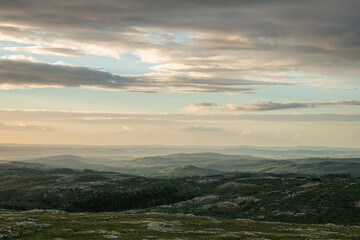 sunset over the misty mountains