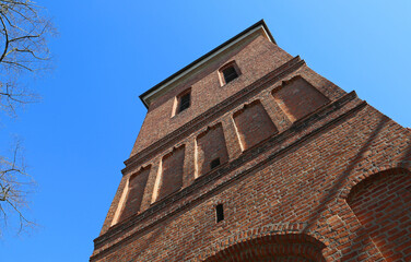 The tower on blue sky - 15th century St Martin and Sr Nicholas Cathedral - Bydgoszcz, Poland