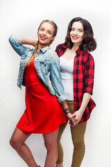 best friends teenage girls together having fun, posing emotional on white background, besties happy smiling, lifestyle people concept