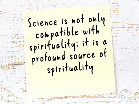 Wise quote on sticky note on wooden wall