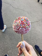 hand with lollipop