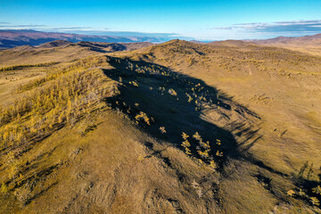 Surroundings of Lake Baikal. Tazheran steppe in autumn. Aerial view.